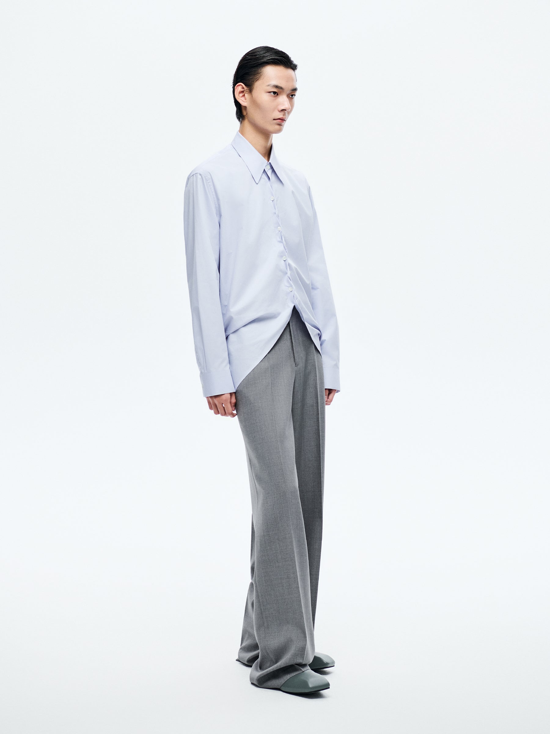 LIGHT BLUE ASYMMETRIC BUTTON SHIRT