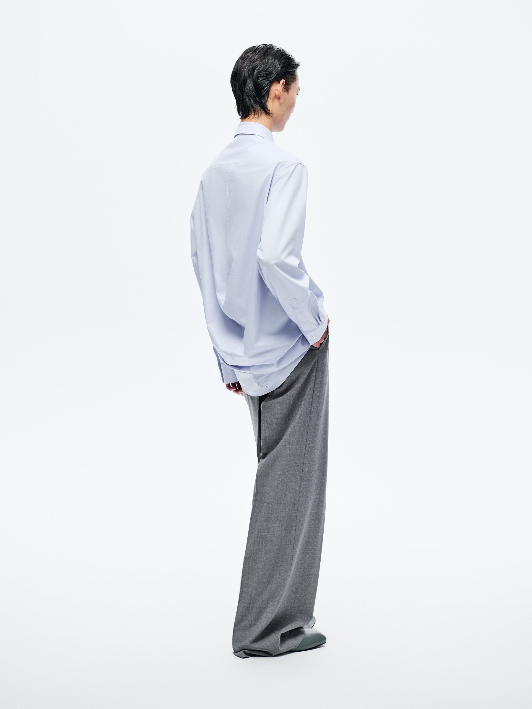 LIGHT BLUE ASYMMETRIC BUTTON SHIRT